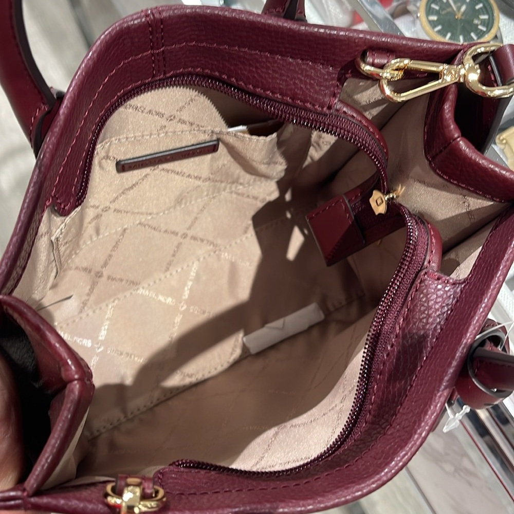 Michael Kors Mirella Small Pebbled Leather Crossbody Bag
Oxblood 
NWT - Picture 10 of 16